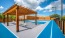 a swimming pool with a covered area