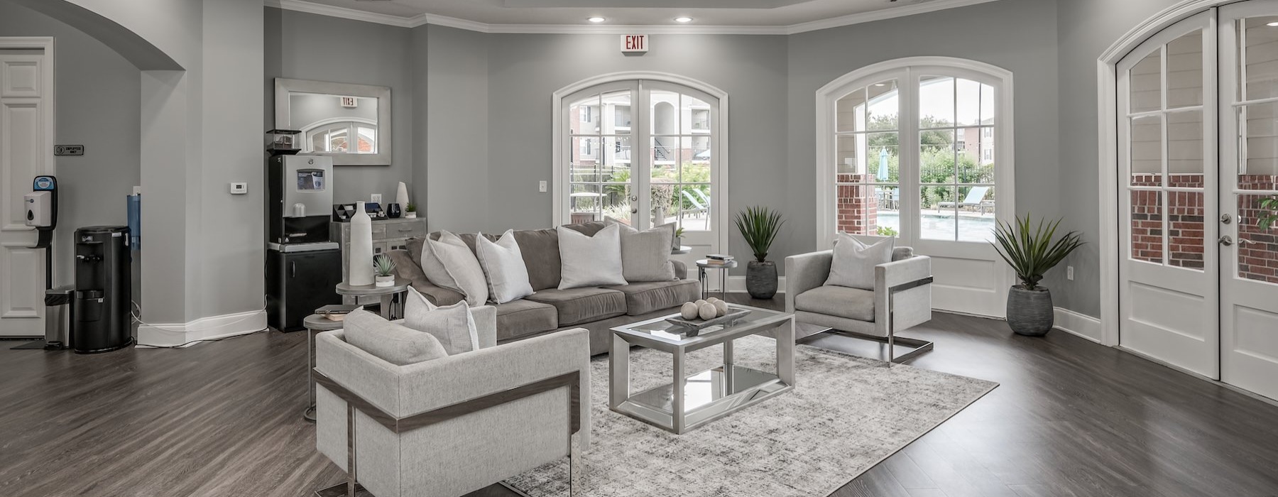 a living room with a large rug
