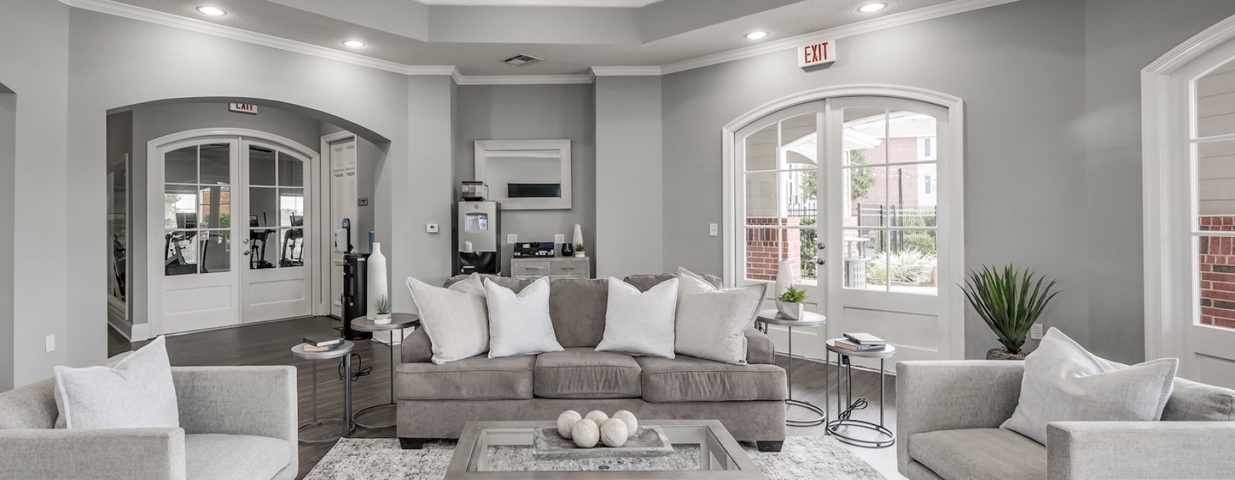 a living room with a large glass door