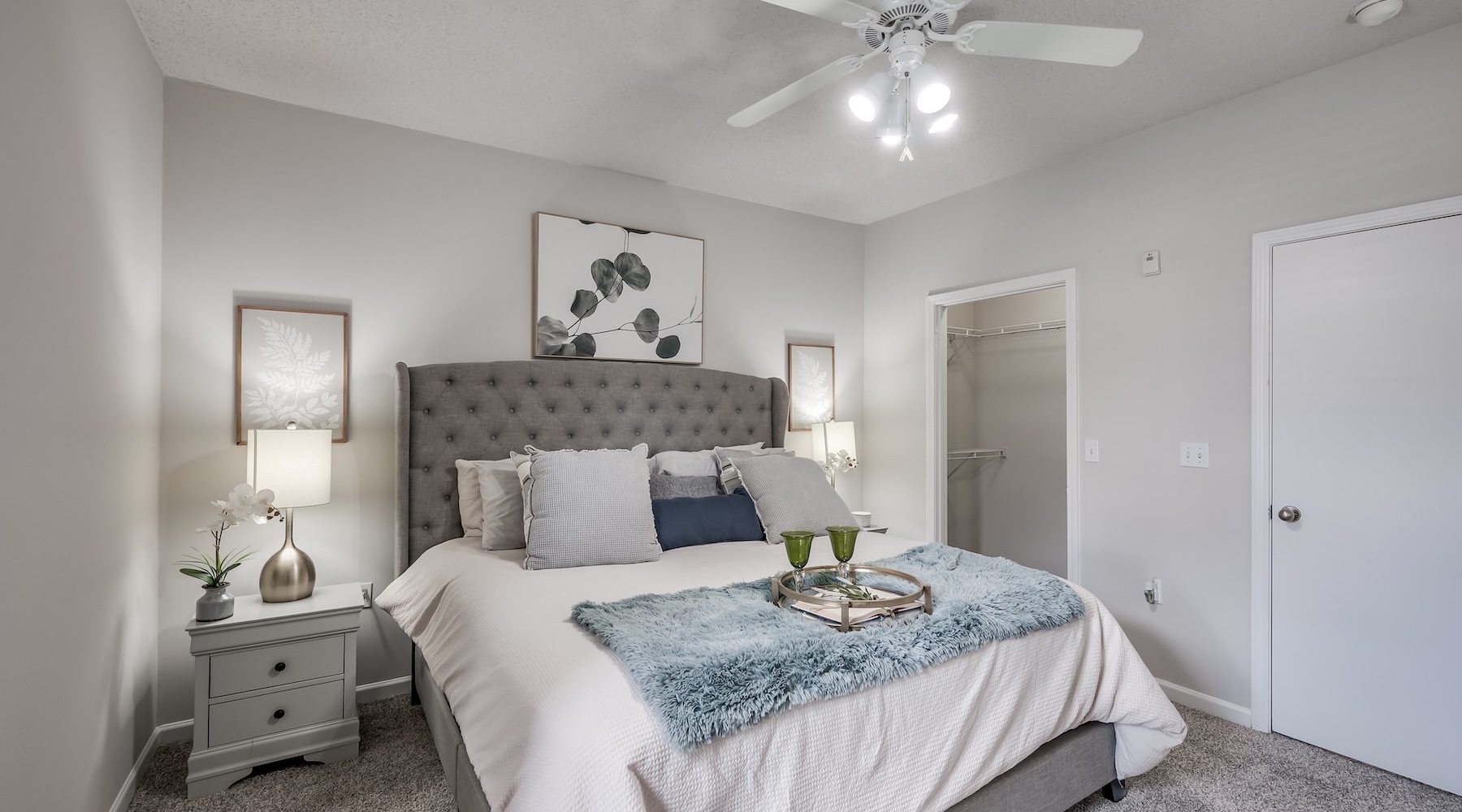 Generous bedroom offerings to fit every family a bedroom with a bed and a nightstand
