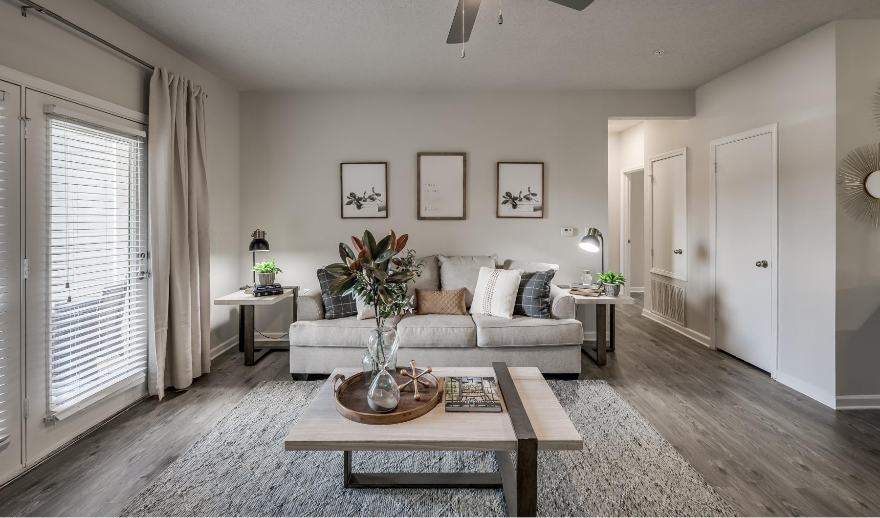 a living room with a couch and a table