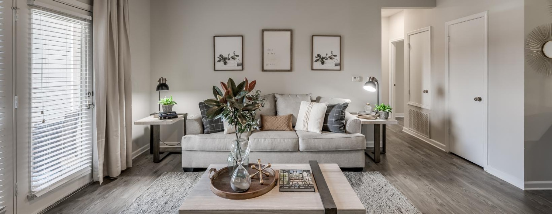 a living room with a couch and a table